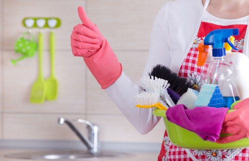 A cleaner working in a typical SE27 period property interior