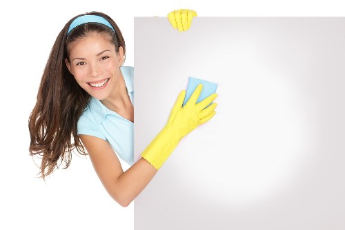 Protective gloves and safety footwear used during professional carpet cleaning